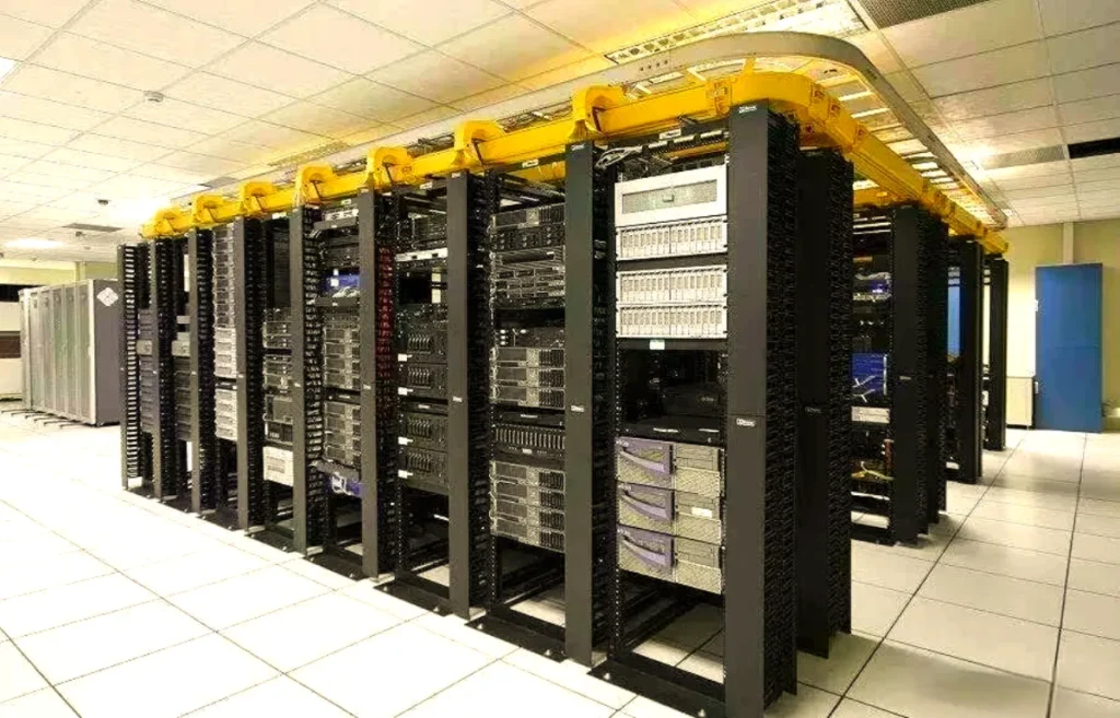 Server Racks Integrated with Yellow Overhead Cable Trays
